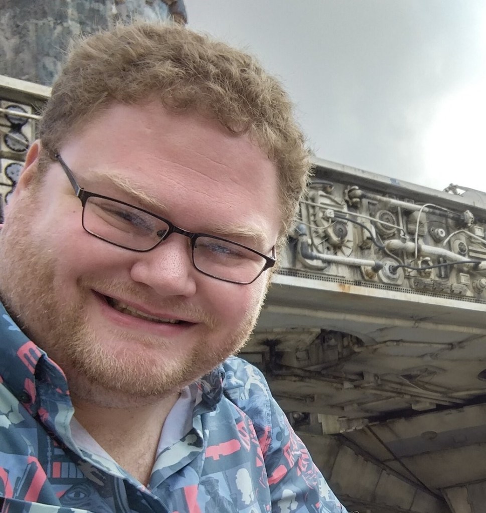 AJ in Front of the Millennium Falcon at Star Wars Galaxy's Edge